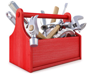 red-wooden-toolbox-with-tools-on-white-background